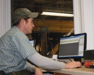 Ag Retailer at Computer