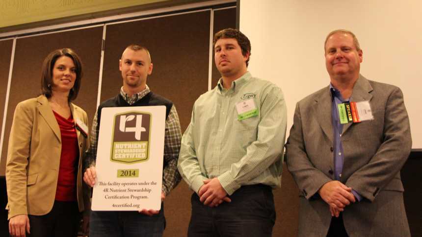 (L-R) Carrie Vollmer-Sanders, Director, Western Lake Erie Basin Project, The Nature Conservancy (left) honors representatives from the first three official 4R Certified ag retailers Legacy Farmers Cooperative, The Morrall Co., and The Anderson's, Inc., during the recent 4R Certification 4U event in Perrysburg, OH.