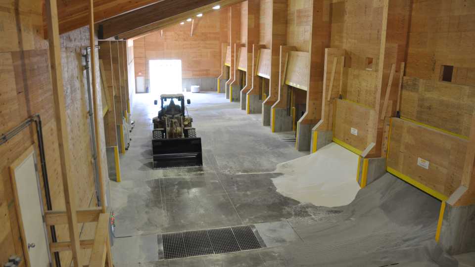 Wilbur-Ellis Miller SD front end loader alleyway