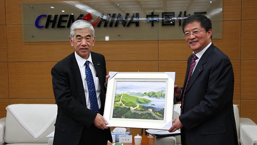 ChemChina General Manager Ren Jianxin (right). (Photo Credit - ChemChina.com.cn)