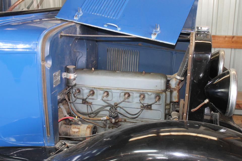 The engine for the 1930 Chevrolet truck was relatively simple looking but still could haul big loads, according to the display sign on the vehicle.
