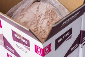 With EvenCoat Technology, WOLF TRAX DDP micronutrients thoroughly coat every granule in a fertilizer blend. This uniform coating ensures micronutrients are evenly distributed throughout the blend. Photo: Koch Agronomic Services